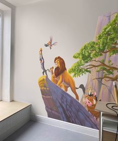 the lion king mural in a children's room