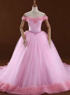 a pink ball gown on a mannequin