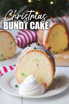 a christmas bundt cake on a plate with whipped cream and sprinkles