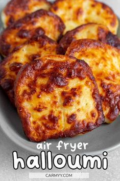 four pieces of pizza on a plate with the words air fryer hallouni