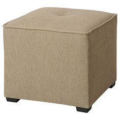 a beige ottoman with black legs and a square seat on the bottom, it is upholstered