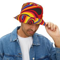 Introducing our Retro Swirls Bucket Hat, a psychedelic blend of style and comfort. This hat is crafted from 100% premium polyester that ensures durability and long-lasting use. Our Retro Swirls design, a mesmerizing pattern of swirling colors and shapes, will transport you back in time or to a different dimension. Available in two sizes, this hat features a sewn-in label for authenticity. It's not just a hat, it's a statement of bold, carefree style. Perfect for summer festivals, beach outings, Carefree Style, Rave Gear, Summer Festivals, Swirl Design, Summer Festival, Back In Time, Festival Outfits, Large Black, Swirl