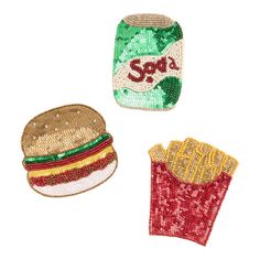 three sequins with different types of food on them, including a hamburger and french fries