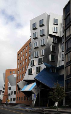 an unusual building in the middle of a city