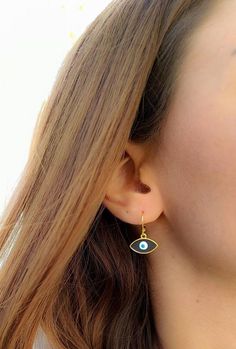 hoop earringsgold hoop earringsdangle earringshuggie hoop earringsclip on earringsgold evil eyeevil eye earringsgold earringsdrop earringsgift for hervintage earringssmall hoop earringselegant earrings evil eye jewelryEvil eye hoop earringsThis cute earrings are made from steell and they are 24k gold plated.You can choose between 4 different clasps (the numbers 1 and 2 are for non pierced ears) and between 2 styles (transparent, black).They are very light and comfortable!Plus they are anti aller Lunar Jewelry, Crescent Moon Jewelry, Jewelry Evil Eye, Witch Earrings, Evil Eye Earrings, Hoop Earrings Gold, Earrings Elegant, Silver Chain Bracelet, Eye Earrings