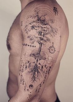 a man with a tree tattoo on his arm