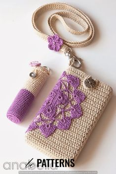 a crocheted purse with two bottles attached to it