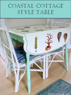 an old table painted with sea life on it and the words coastal cottage style table