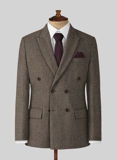 Sophisticated attire that doesn't sacrifice practicality in favor of elegance. Crafted from wool, our brown tweed suit is ideal for any occasion. Pair back your look with a white shirt and brown shoes to liven it up.     Look Includes  Dapper Brown Tweed Fabric  Double Breasted Jacket Style  Peak Lapel  Horn Brown Buttons  Single Vent  Three Cuff Buttons  Two welted back pockets on trousers    Click 'Customize Now' to modify the look if needed.   Lining: Viscose; Dry Clean. Semi-formal Notch Lapel Tweed Jacket, Formal Brown Blazer With Welt Pockets, Double-breasted Brown Wool Sport Coat, Semi-formal Brown Blazer With Welt Pockets, Brown Semi-formal Blazer With Welt Pockets, Brown Suits With Welt Pockets And Lapel Collar, Brown Double Breasted Suit With Welt Pockets For Work, Brown Notch Lapel Formal Blazer, Classic Tweed Suit For Business Casual