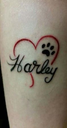 a tattoo with the word harley written on it and a dog's paw in the shape of a heart