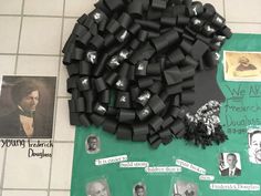 there are many pieces of black plastic on the floor next to pictures and magnets