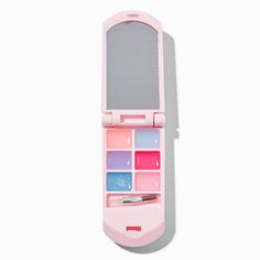 Instead of sending a text, use this flip phone lip gloss set to send a message that your makeup is always on point. Show off your cute cosmetic compact that holds 7 lip colors and comes complete with a mirror for application.Claire's Club is our unique collection specifically designed for our younger customers. Carefully constructed to be safe for toddlers & young children, these accessories are recommended for ages 3-6.Lip Gloss Set by Claire's Club. Included: 8 lip glosses, 1 applicator1.5W x Y2k Makeup Phone, Flip Phone Makeup, Makeup Flip Phone, Flip Phone Mirror, Cute Lipgloss, Claire's Makeup, Phone Craft, Y2k Makeup, Brown Puppies