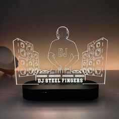 a dj - steel fingers light up in the shape of a man with headphones