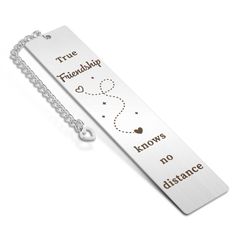 a bookmark with the words true friends knows no distance on it and a chain attached to it