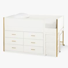 a white and gold bunk bed with drawers on the bottom, and a pillow on top