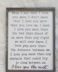 a framed poem with the words, i love you more than us