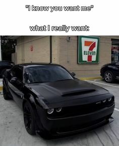 a black car is parked in front of a gas station with the caption, i know you want me? what i really want