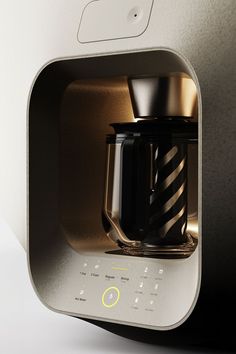 a close up of a microwave with a coffee cup in it