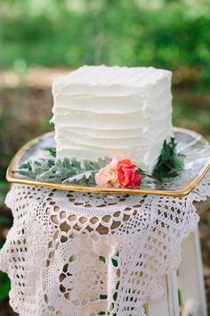 a white cake sitting on top of a table