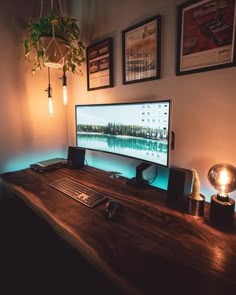 a computer monitor sitting on top of a wooden desk