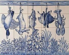 blue and white tiles with fish hanging from hooks