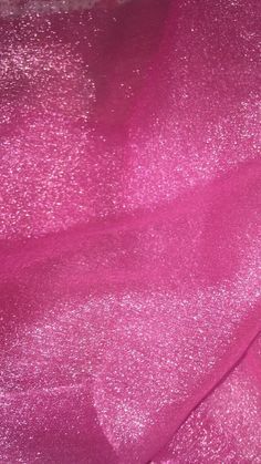 the pink fabric is very shiny and has some sparkles on it's surface