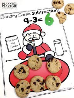 chocolate chip cookies and santa's helper are on the table with an activity sheet