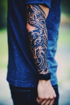 Person's arm with detailed black tribal tattoo wearing a blue shirt and wristwatch. Tattoos Arm Mann, Tato Maori, Tattoo Foot, Maori Tattoos, Polynesian Tattoo Designs, Men Tattoos, Marquesan Tattoos, Maori Tattoo Designs, Tattoo Inspiration Men