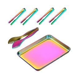 there are four different colored utensils in the tray