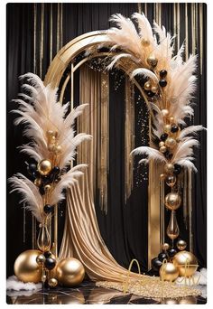 a black and gold party decoration with feathers