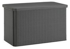 an outdoor wicker box with black plastic cover on the top and bottom, in front of a white background