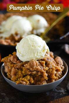 a close up of a bowl of food with ice cream on top and pumpkin pie crisp in the background