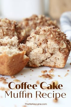 a muffin cut in half sitting on top of a white plate with the words coffee cake muffin recipe