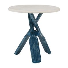 a white table with blue wooden legs and a round top, against a white background