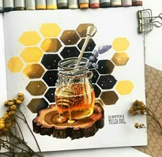 a drawing of a honey jar with a wooden spoon and honeycombs on it