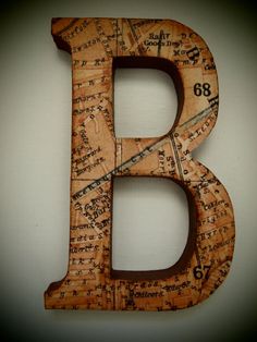 the letter b is made out of sheet music