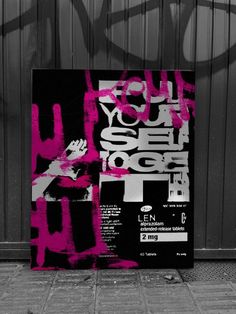 a black and white poster with pink graffiti on it