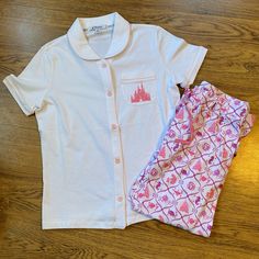 Disney Parks Pajama Set With Cinderella’s Castle On The Shirt And Logos For Many Of The Disney Princesses On The Pants. Disney Pjs For Teens, Disney Family Pajamas, Disney Pjs Primark, Disney Pjs Fluffy, Disney Sleepwear For Women, Disney Pajamas For Women, Orlando Outfits, Disney Pjs, Princess Pajamas