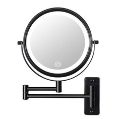 a black wall mounted mirror with a light on it's side and an arm