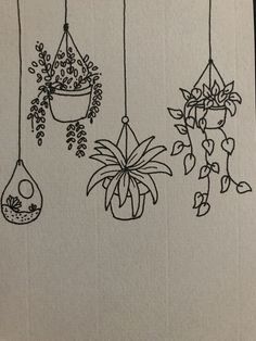 four hanging planters with plants in them on a piece of paper that has been drawn