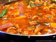 a pot filled with lots of different types of food