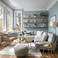 a living room filled with furniture and lots of windows covered in blue paint on the walls