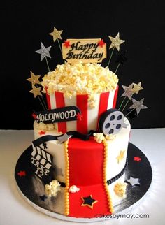 a birthday cake decorated with popcorn and stars