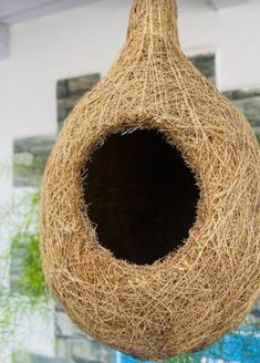 a bird nest hanging from the ceiling