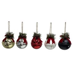 four christmas ornaments hanging from hooks on a white background