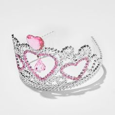 Reign with love with this Claire's Club heart crown! You'll look like royalty wearing the silver-tone crown with a centered pink heart gem, and an assorment of faux gems for an added touch. Add this piece to your dress-up bin for a regal look. Crown by Claire's Club Faux gemstones Material: Plastic Suitable for ages 3-6 - Claire's Club Pink Heart Crown Pink Princess Jewelry For Wedding, Adjustable Rhinestone Teardrop Crown, Pink Pinched Crown For Party, Party Crown With Rhinestones And Structured Shape, Teardrop Rhinestone Crown For Party, Teardrop Rhinestone Party Crown, Adjustable Princess Crown For Party, Princess Crown With Structured Design For Party, Princess Crown With Structured Shape For Party