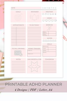 the printable ad planner is shown on top of a desk with pink and gold accessories