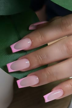 Pink French tip nails that give a light and bubbly twist to the classic French manicure. Pink French Tip Nails Tapered Square, Light Pink French Tip Nails Coffin, Square Nails Pink French Tip, Light Pink And Hot Pink Nails, French Nails Light Pink, Coffin Pink French Tip Nails, Pink French Tip Coffin Nails, Pale Pink French Tip Nails, Square Pink French Tip Nails