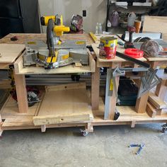 a workbench with tools on it in a garage