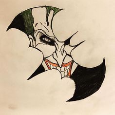 a drawing of a man's face in the shape of a bat with green eyes